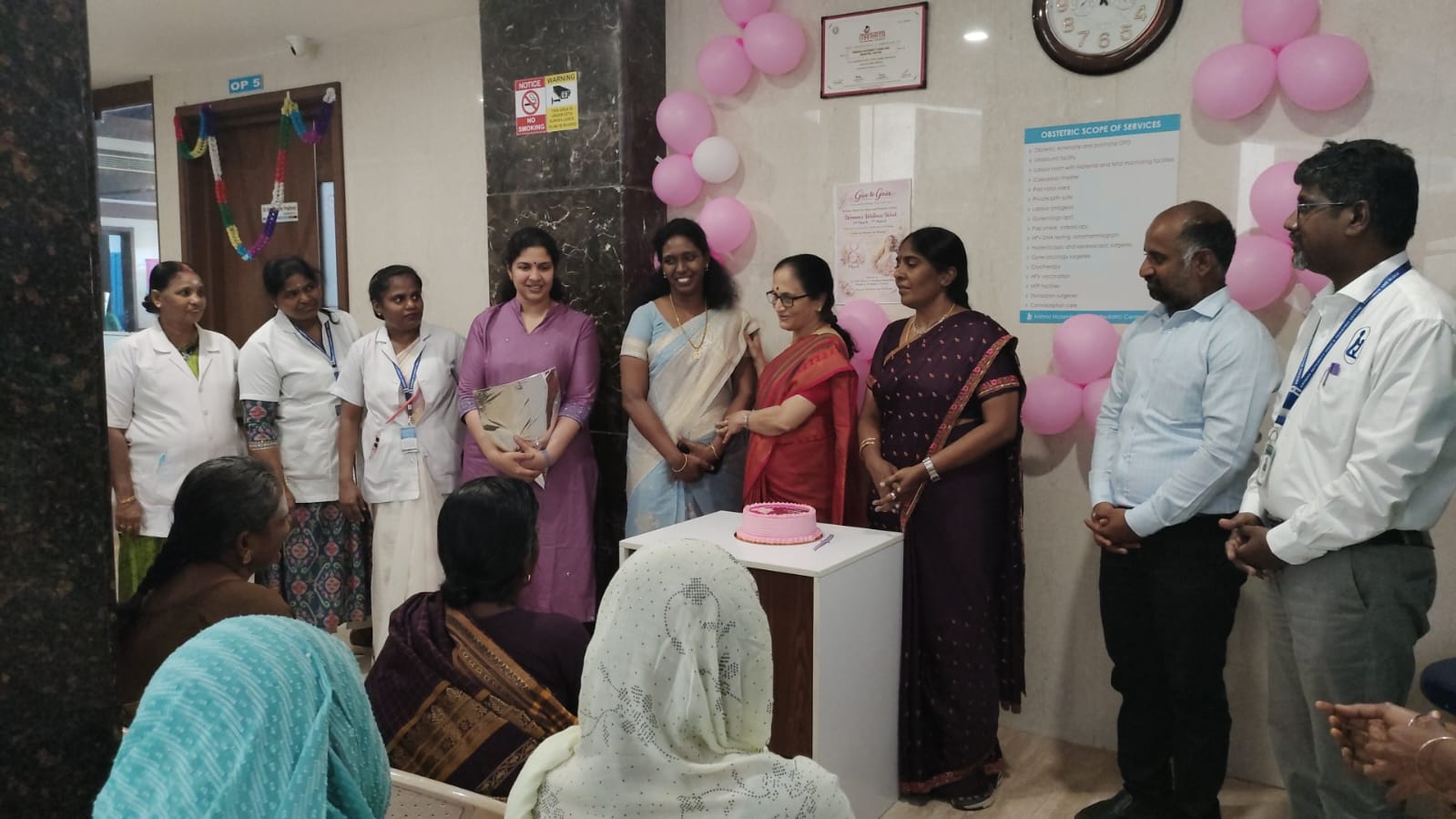 Krishna Hospital staff celebrating a milestone event with cake
